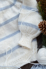 Striped baby sweater made of high quality woolen yarn