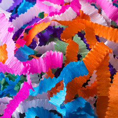 colorful crepe ribbons, tangled ribbons taken in shallow depth of field, abstract background
