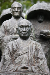 Fototapeta na wymiar Zen pilgrim statue by Torao Yazaki