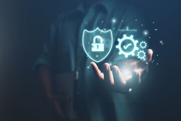 The concept of business men In the hand shows a blocked holographic digital network of business information.	