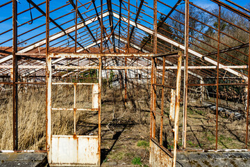 Abandoned greenhouse. Ruined abandoned greenhouse complex