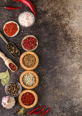 various spices on a brown background