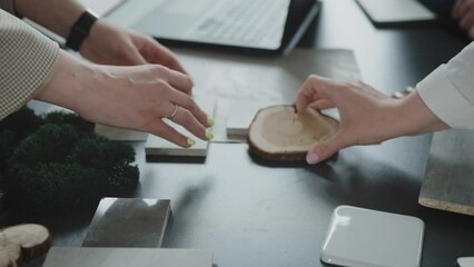 Interior design studio. Designers with architects and clients select solutions and combinations of materials for the interior of the room.