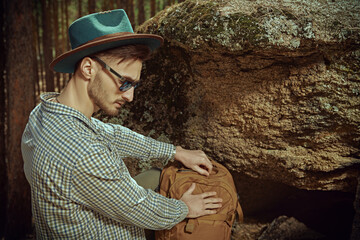 backpacker in forest