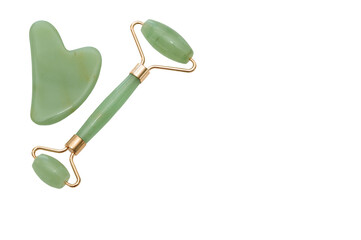 Jade Green Facial Roller Massager and Guasha Scraper isolated on white background. Skin care at home, anti-aging, beauty industry items. Free space for text