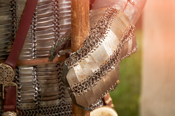 Vintage armor, retro chain mail and a protective metal glove. Ancient military arsenal of the...