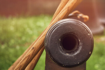 Vintage swedish cannons and metal cannonballs. Ancient military arsenal of the events of the...