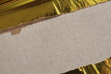 Torn pieces of paper texture copy space background. Gray beige and gold color.