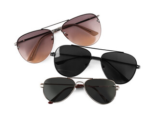 Different stylish sunglasses on white background. Sun protection
