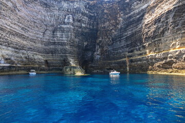 View of the coast of Lampedusa island sea paradise for yachts and swimmers. Lampedusa, Italy -...