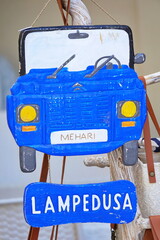 A classic tourist gift depicting the typical Mehari car from Lampedusa. LAMPEDUSA, ITALY - AUGUST, 2019