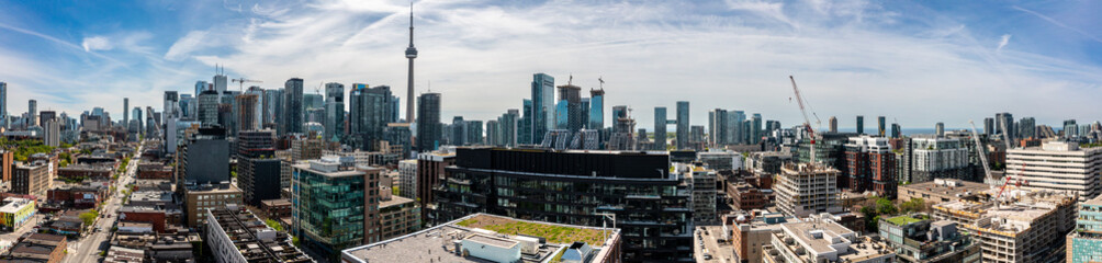 Panorama of downtown Toronto skyline with views of the cntowers and downtown Toronto buildings 