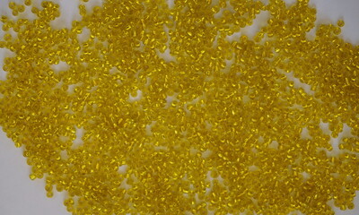 Obraz premium Yellow Glass Beads as Background
