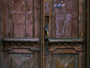 Old textured door with lovely carpentry work 