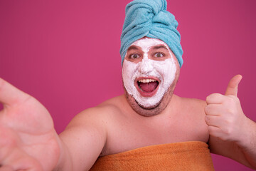 Funny fat man and beauty procedures. Clay mask.	