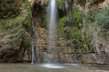 Waterfall and pool in the desert. Waterfall, Ein Gedi, Israel