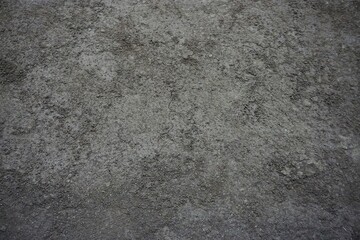 Trockener grauer Sandboden mit Muster