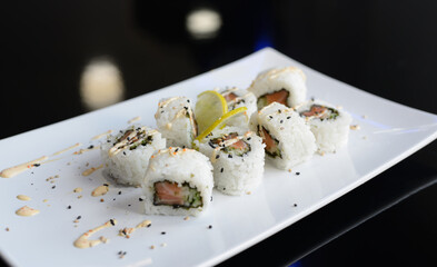 Japanese sushi on a white plate.