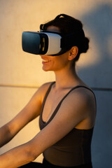 Beautiful girl meditates in the digital universe. Fitness of the future. Innovations. Virtual reality. VR glasses.