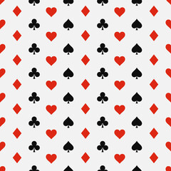 Seamless pattern with card suits - hearts, clubs, spades and diamonds. Casino gambling, poker background. Alice in wonderland ornament.