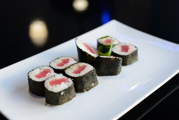 Japanese sushi on a white plate.