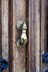 Old door with iron knocker