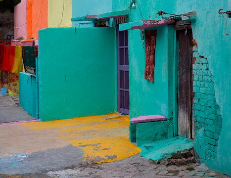 Bright colors of Indian street. Entrance door of an Indian house. Bright doors