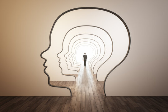 Abstract image of businessman walking through head outline corridor. Thinking, maze, solution and answer search concept.