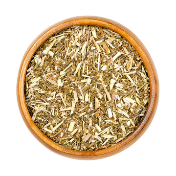 Sweet Wormwood, Dried Herb, Artemisia Annua In Wooden Bowl. The Discovery Of The Plant Extract Artemisinin Is A Nobel Prize Awarded Medication Used To Treat Malaria. Used In TCM As Tea To Treat Fever.