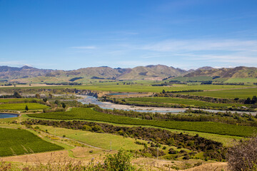 The Awatere River flows down through Seddon towards the sea in the Marlborough District of New Zealand 
