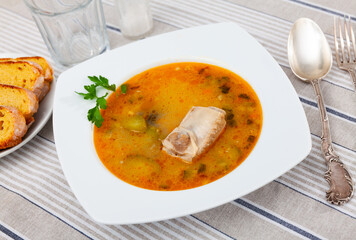Popular dish of Russian cuisine is Pickle soup with meat, cooked on the basis of pickled cucumbers...
