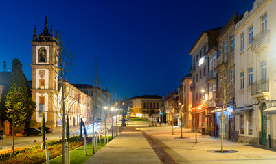 Evening photo of Av. Carvalho Araujo with turned on city lights. Main avenue of Vila Real, Portugal.