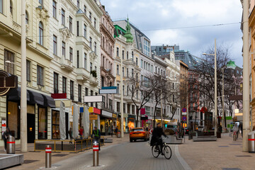 Winter street at daytime in Vienna, Austria. Capital city street.
