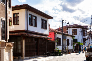 Fototapeta na wymiar Old town streets of Konya, Turkey. Paved street with restaurants and cafes.