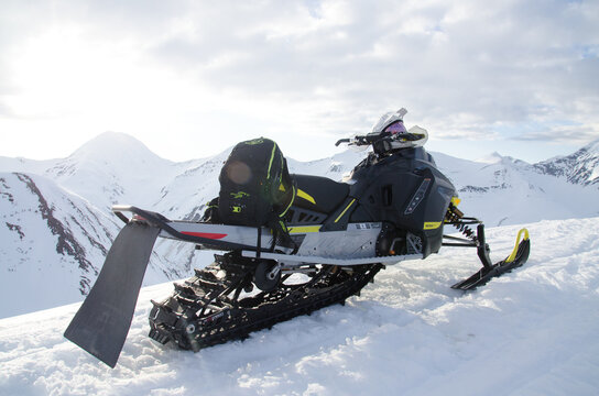 Alaska Snowmachine Rider In The Backcountry 