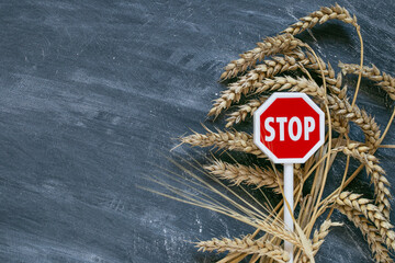 Wheat import and export ban.Stop on the import and export of wheat.Wheat ears and red stop sign on...
