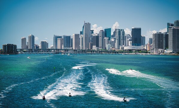 city skyline beautiful sea downtown miami usa florida life travel people on jet ski 
