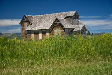 Fototapeta na wymiar Abandoned old church in Cedar Lane, Paris Idaho