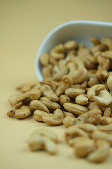 White bowl with cashew nuts