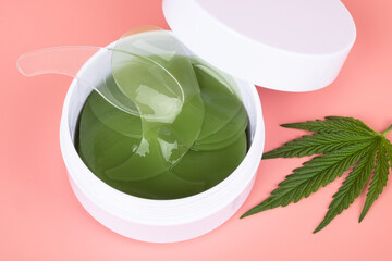 medical cannabis eye patches, cannabis and skin care on pink background .