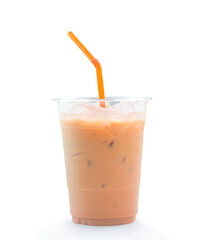 Orange Thai iced condensed milk tea in transparent plastic glass with straw isolated on white background with clipping path