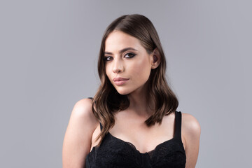 Fototapeta premium Beauty fashion portrait. Beautiful brunette woman face for perfume cosmetics advertising. No filter unaltered skin.