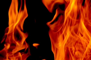 Abstract blur of Fire flames on black background. Burning power.