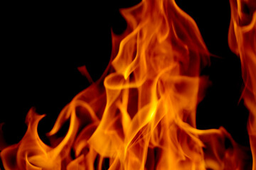 Abstract blur of Fire flames on black background. Burning power.