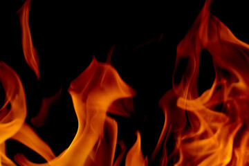 Abstract blur of Fire flames on black background. Burning power.