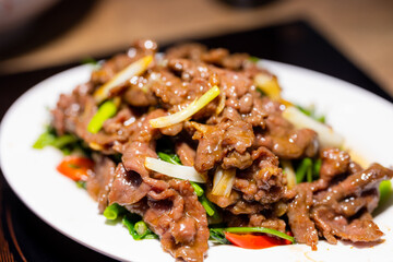 Fry vegetable with beef on the table