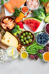 Healthy food assortment on light background.