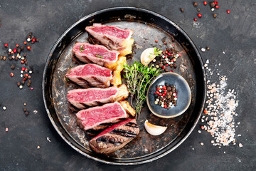 Grilled beef steak with pepper and salt.