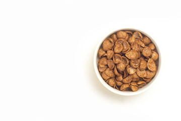 An image isolated and top view cocoa cereal in the bowl is a breakfast food fresh with copy space for text.