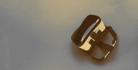 Tinted image of vr glasses on an abstract background. A popular virtual reality gadget.